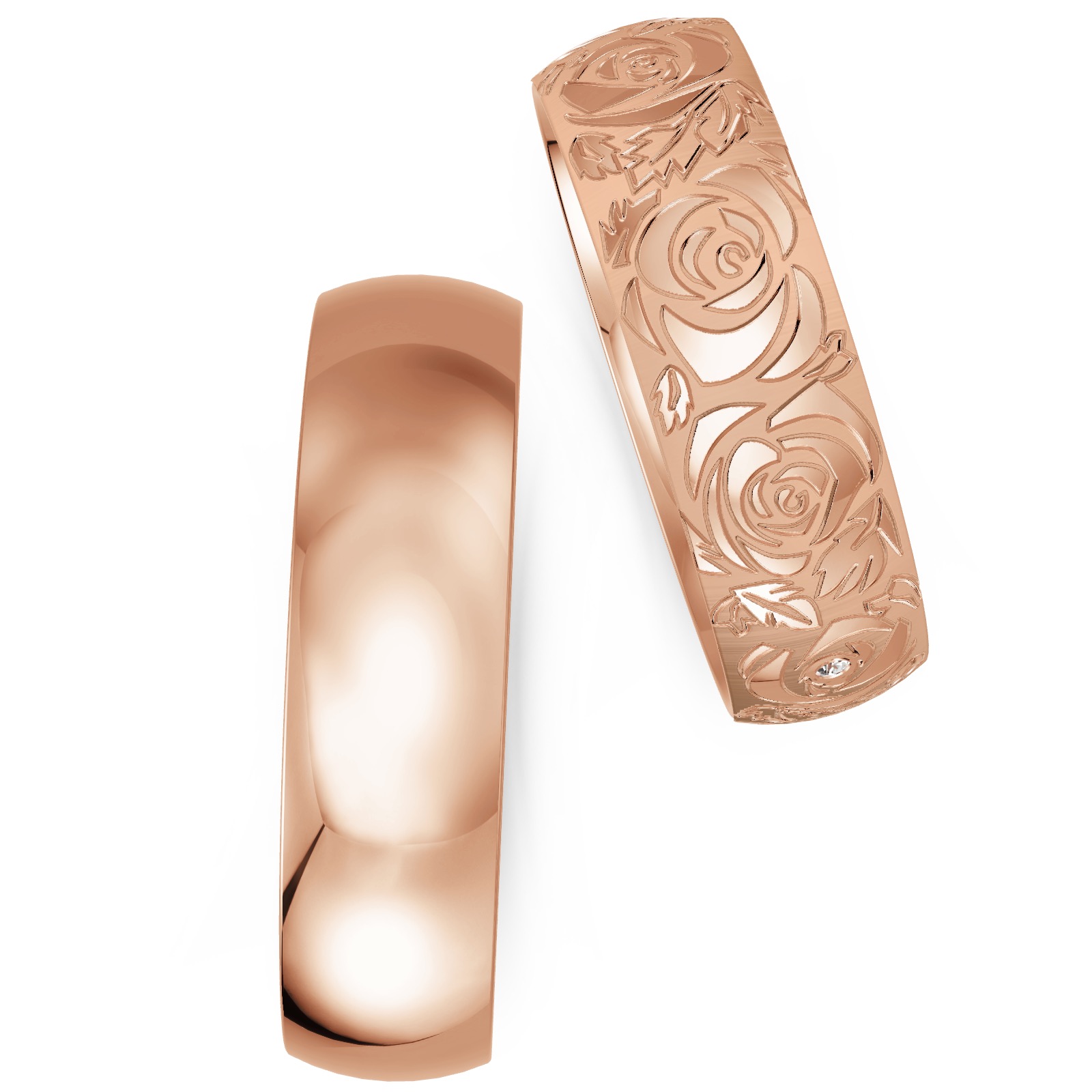 Roségold Trauringe mit Rosenmuster als Dekor und zartem Diamanten 