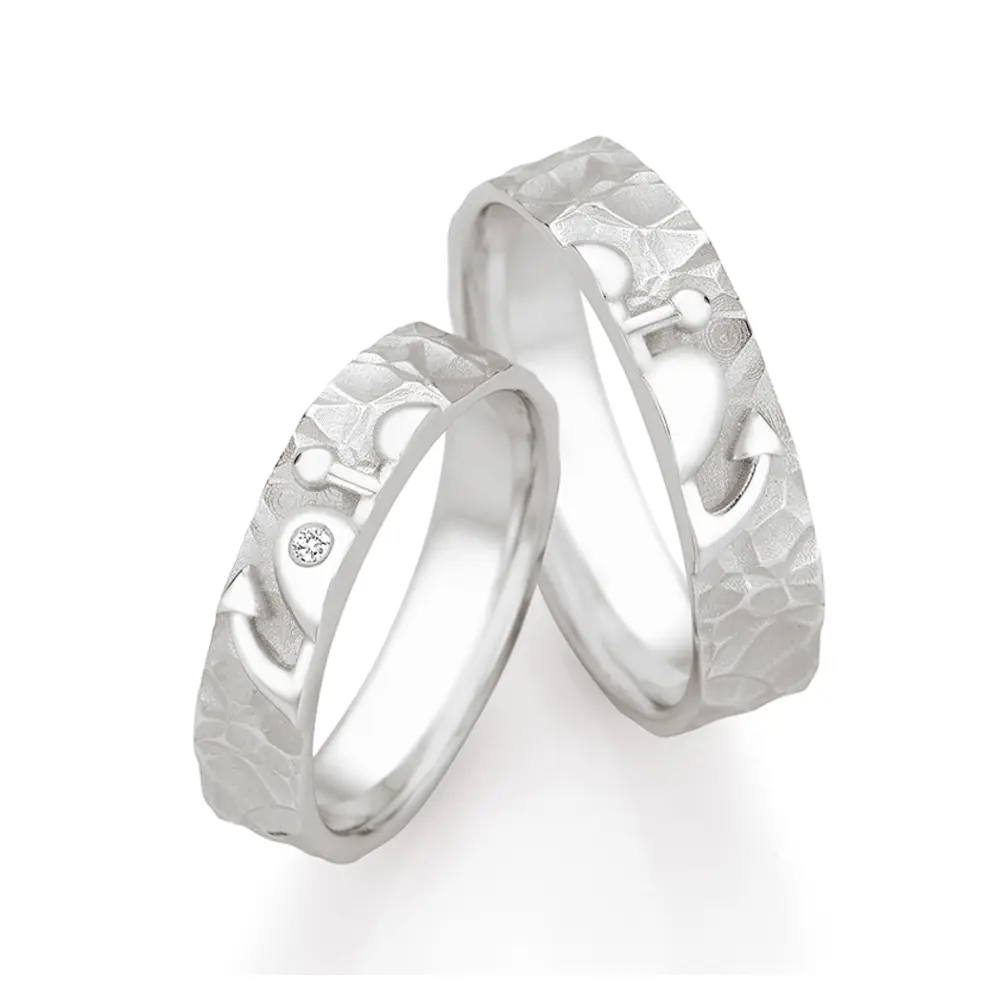 Eheringe aus 925er Silber mit Glaube Liebe Hoffnung als Symbol und Diamant