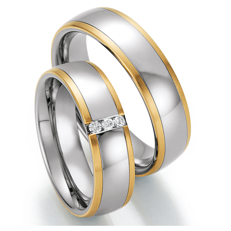 Eheringe Trauringe aus Stahl & Gelbgold mit Diamant Ruesch Collection Nowotny 88/60130-060