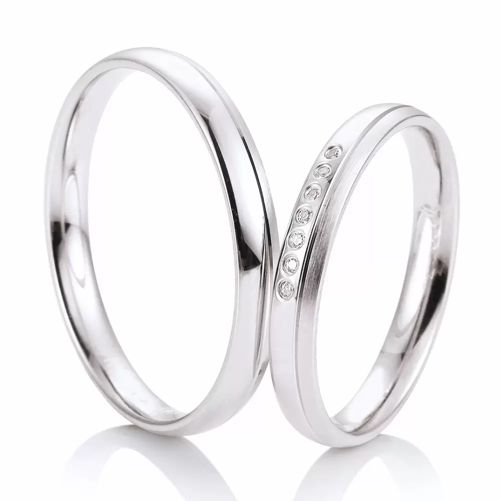 3 mm breite Weissgold Eheringe mit 7 einzeln gefassten Diamanten