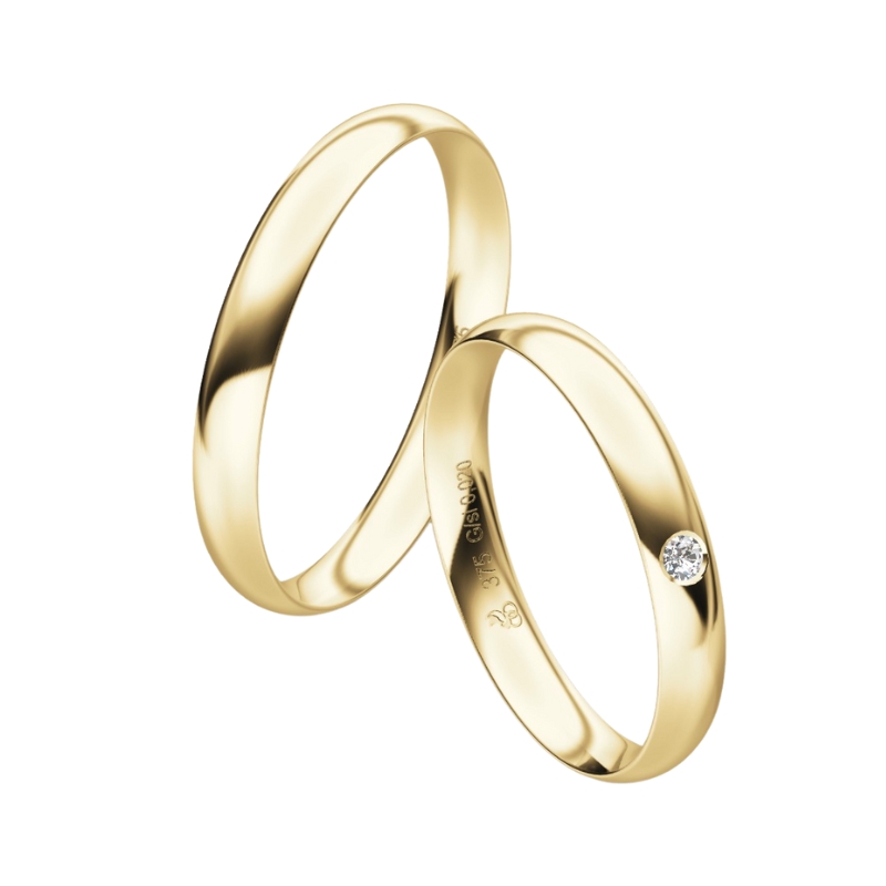 Trauringe aus Gelbgold mit abgerundetem Profil und Diamanten
