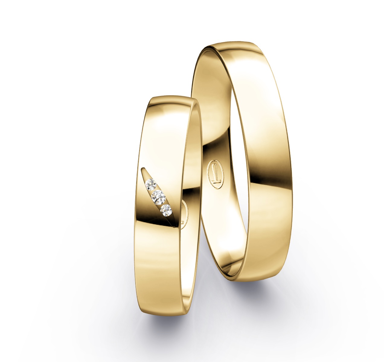 Gelbgold Eheringe mit Polierung und 3 Diamanten in rautenförmiger Vertiefung