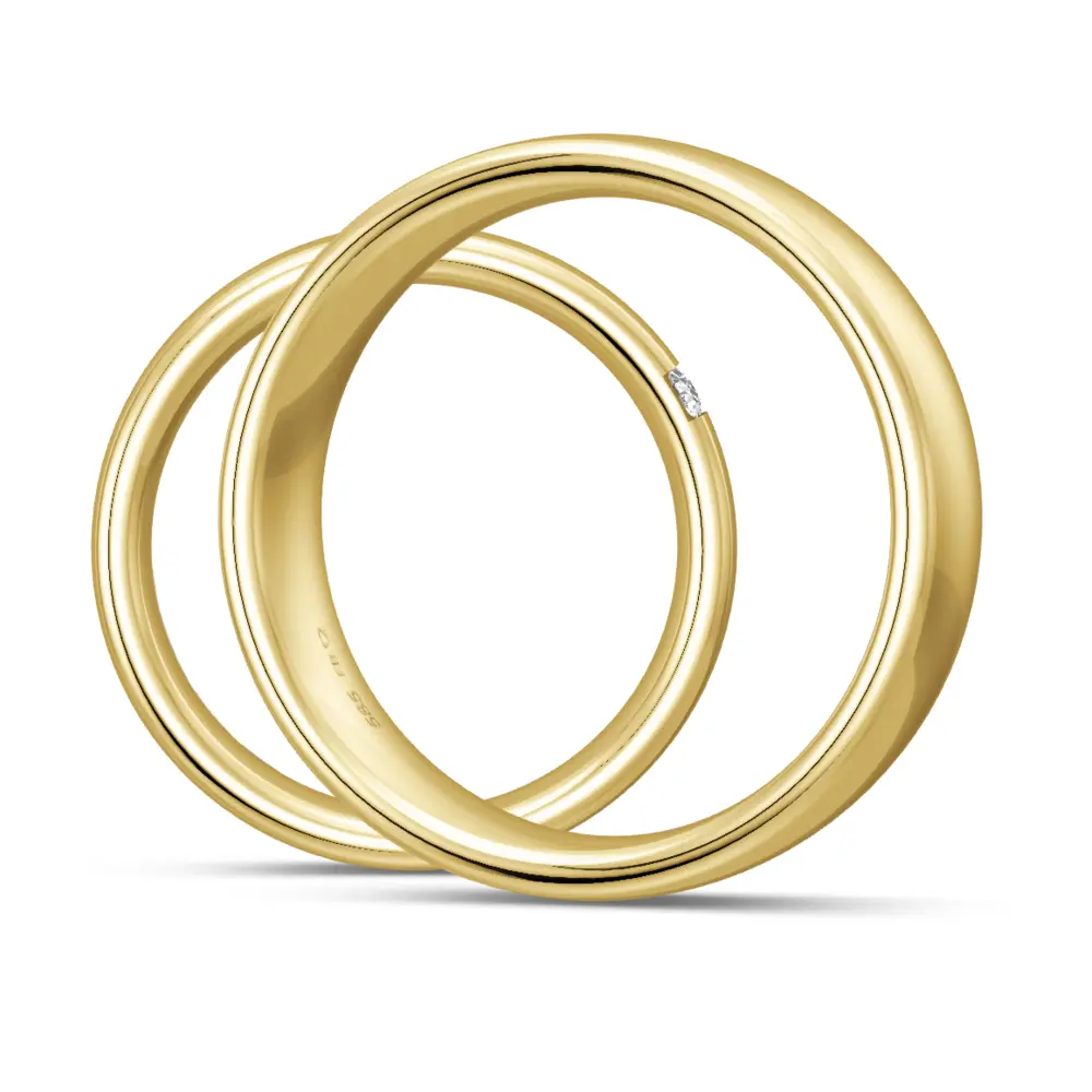 Breite 6,5 mm Gelbgold Eheringe mit Polierung und drei Diamanten seitlich
