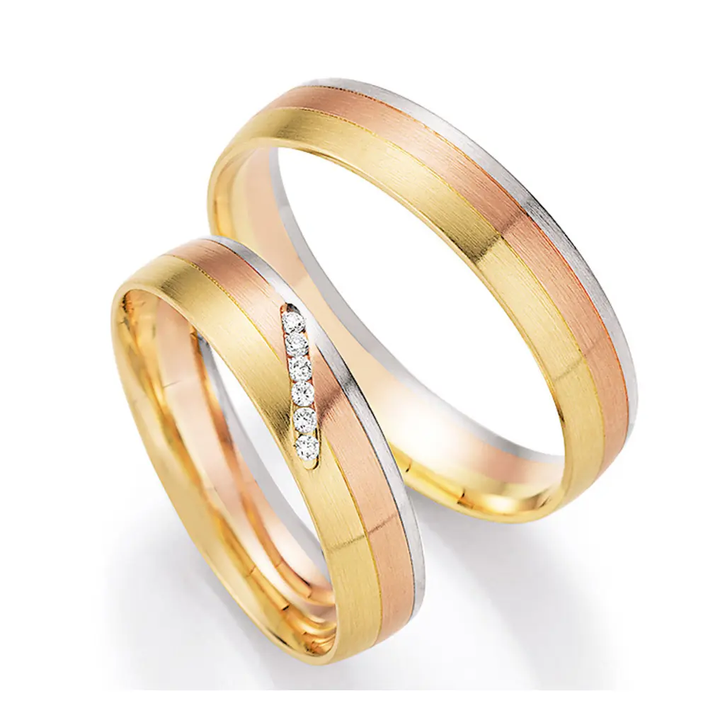 Eheringe aus Weiß-,Gelb- & Rotgold mit Diamanten in Sonnenuntergang-Optik