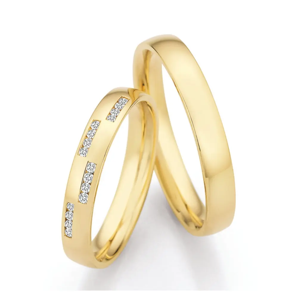 Polierte Gelbold Eheringe mit mehreren Diamantenclustern