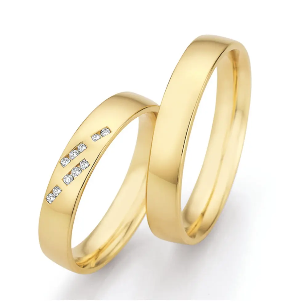 Mit Polierung gestaltete Gelbold Eheringe mit zwei Diamanten-Streifen