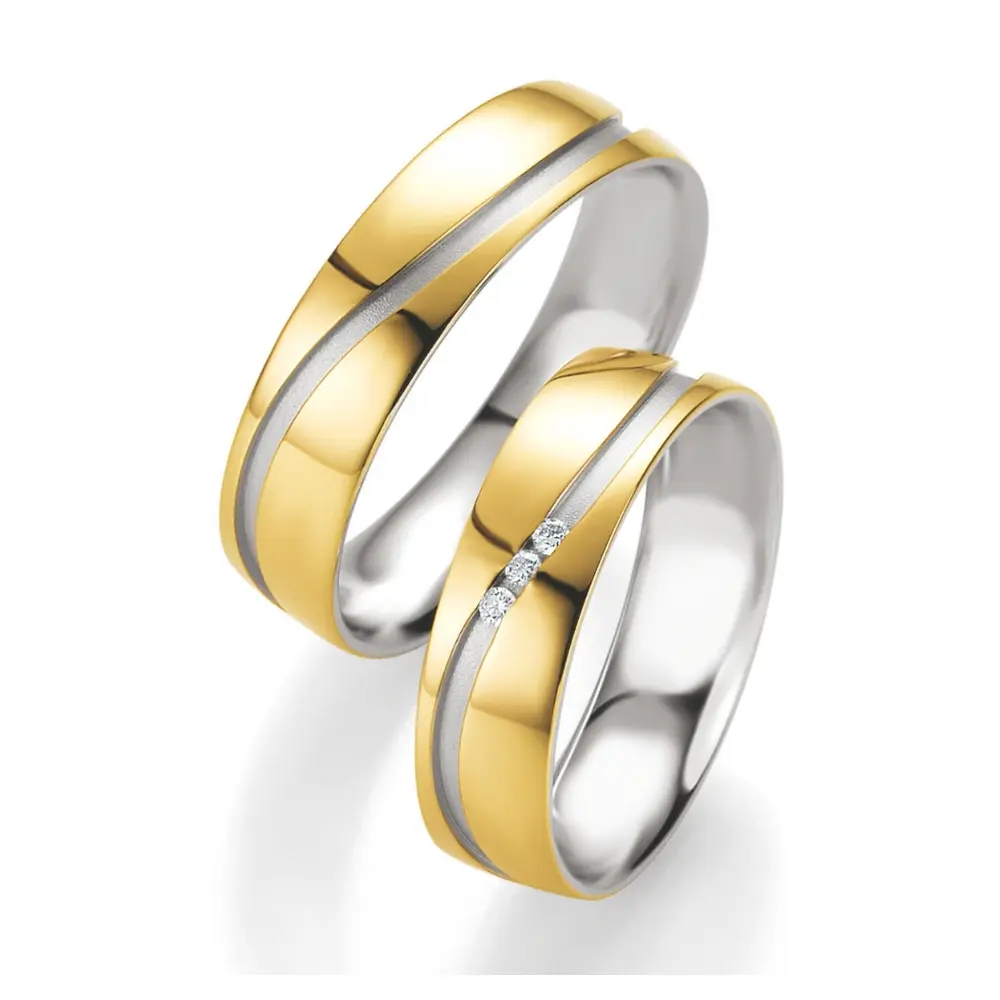 Trauringe aus Silber 925 mit mattem 585er Gelbgold und 3 Diamanten