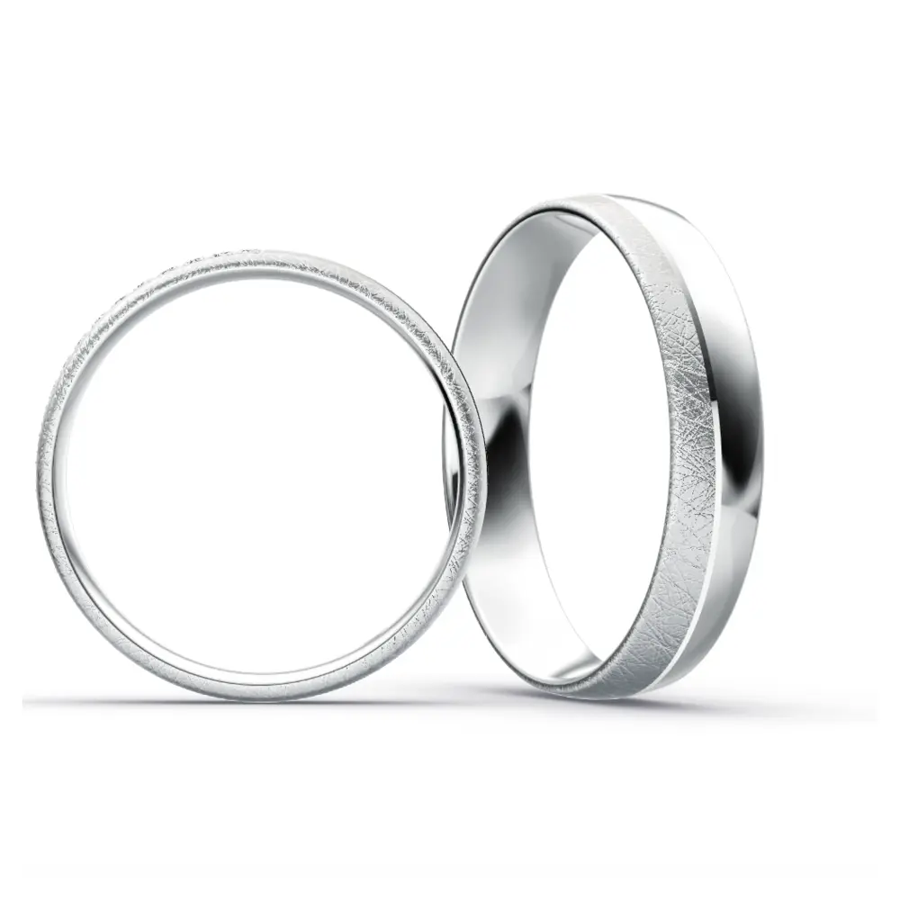 Polierte und eismatte Eheringe aus Plagentum mit einem Diamantenband im Damenring seitlich