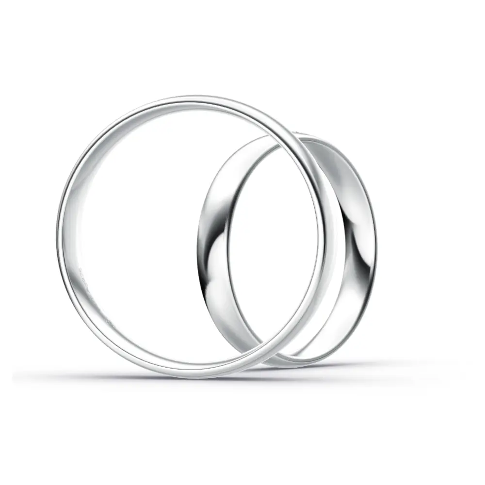 Plagentum Eheringe poliert in zwei Breiten mit 16 Diamanten im Damenring seitlich