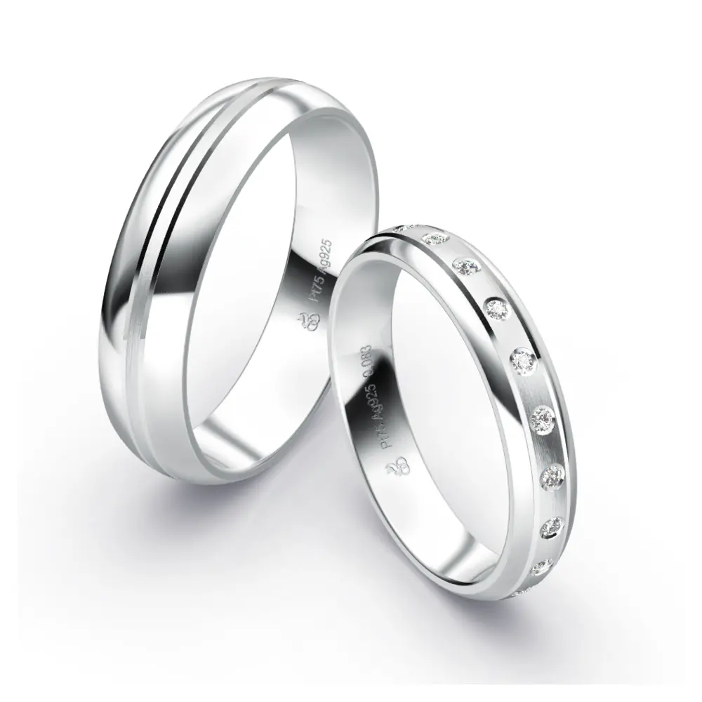 gerundete Plagentum Eheringe mit Rillendesign und 11 Diamanten