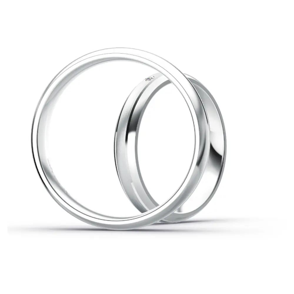 gerundete Plagentum Eheringe mit Rillendesign und 11 Diamanten seitlich