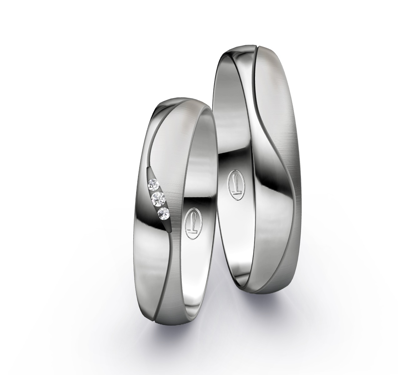 Eheringe aus Platin 600 mit 3 Diamanten in tropfenförmiger Rille
