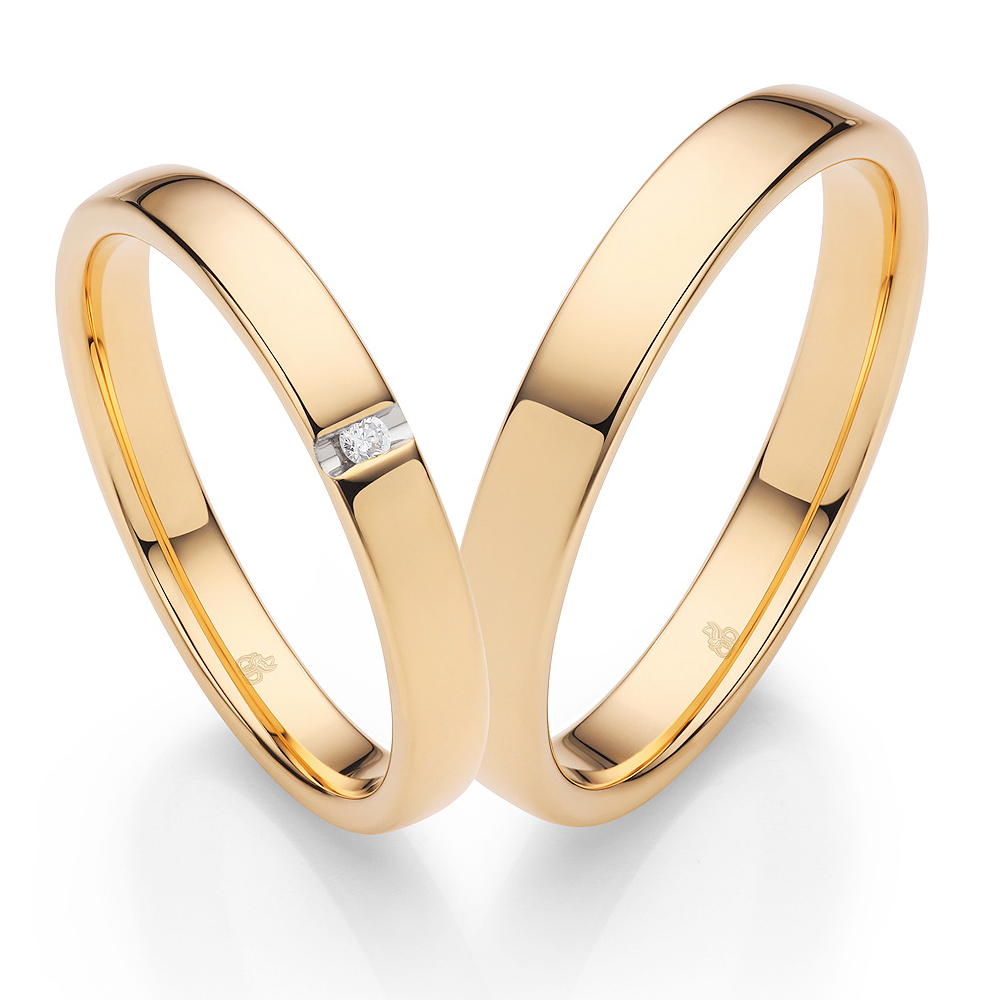 Eheringe aus poliertem Sommergold und Diamanten