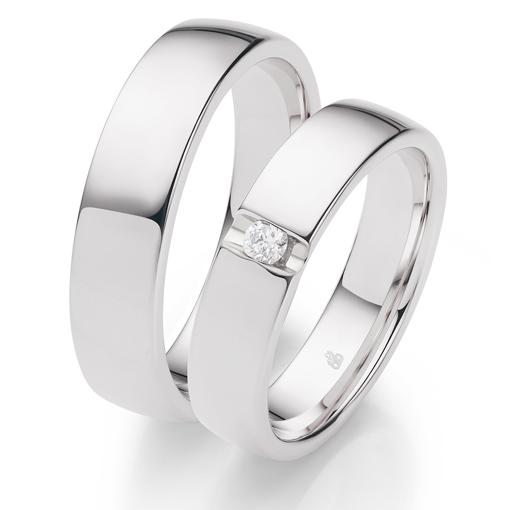 Eheringe aus Weißgold mit polierter Oberfläche und Diamant