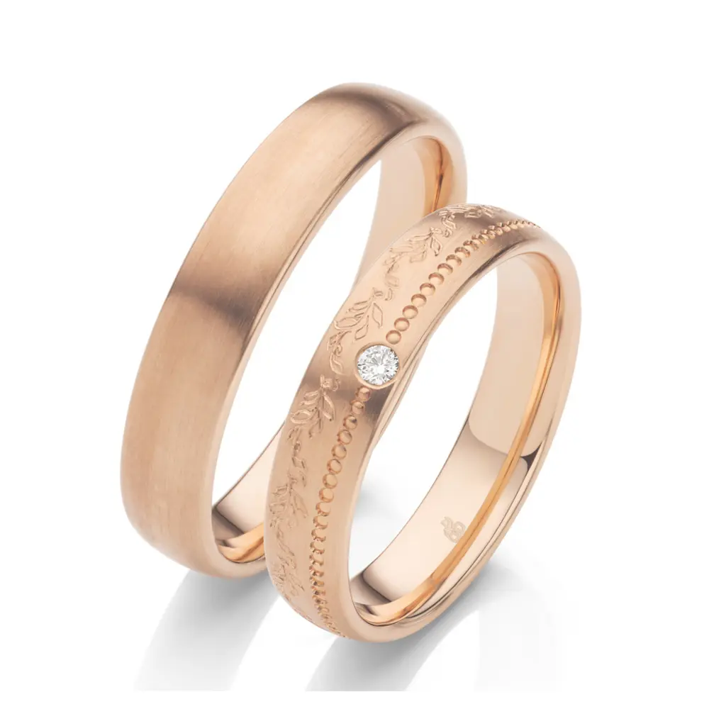 Roségold Eheringe mit Diamanten und blumigem Muster im Damenring