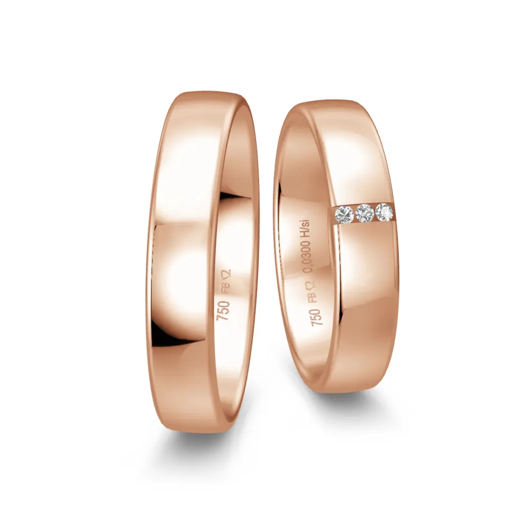 Rotgold Eheringe in polierter Gestaltung mit drei Diamanten je 0,01 Karat