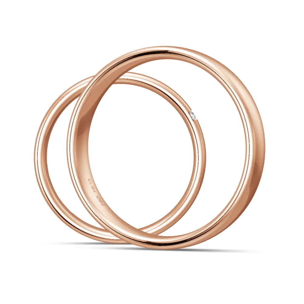 Rotgold Eheringe in polierter Gestaltung mit drei Diamanten je 0,01 Karat seitlich