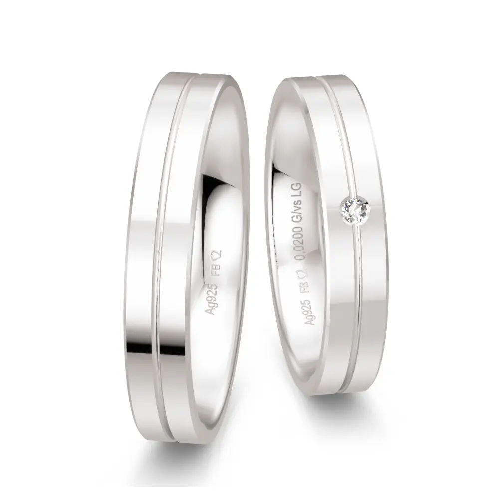 Trauringe aus glänzendem Silber mit feiner Rille und Labor Diamant