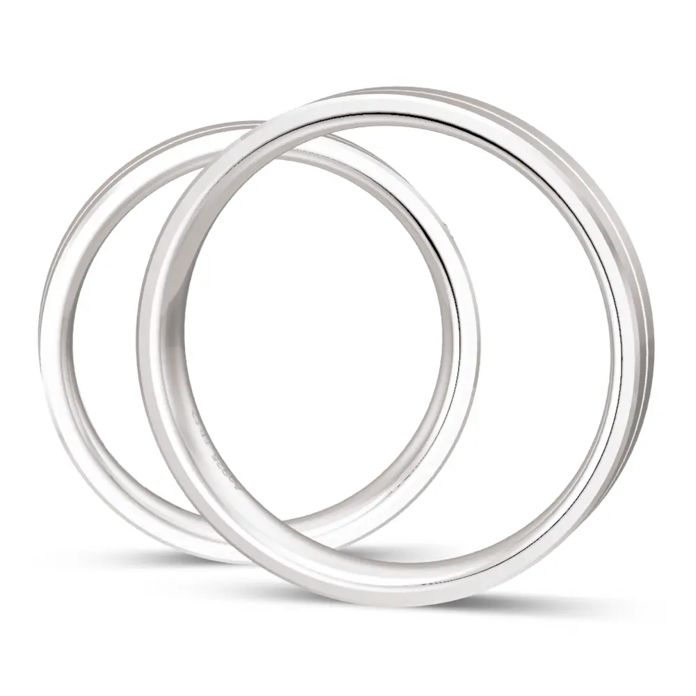 Trauringe aus glänzendem Silber mit feiner Rille und Labor Diamant seitlich