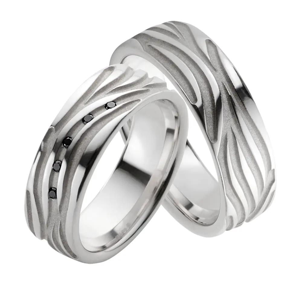 Eheringe aus rhodiniertem Silber 925 mit 5 schwarzen Diamanten und Muster