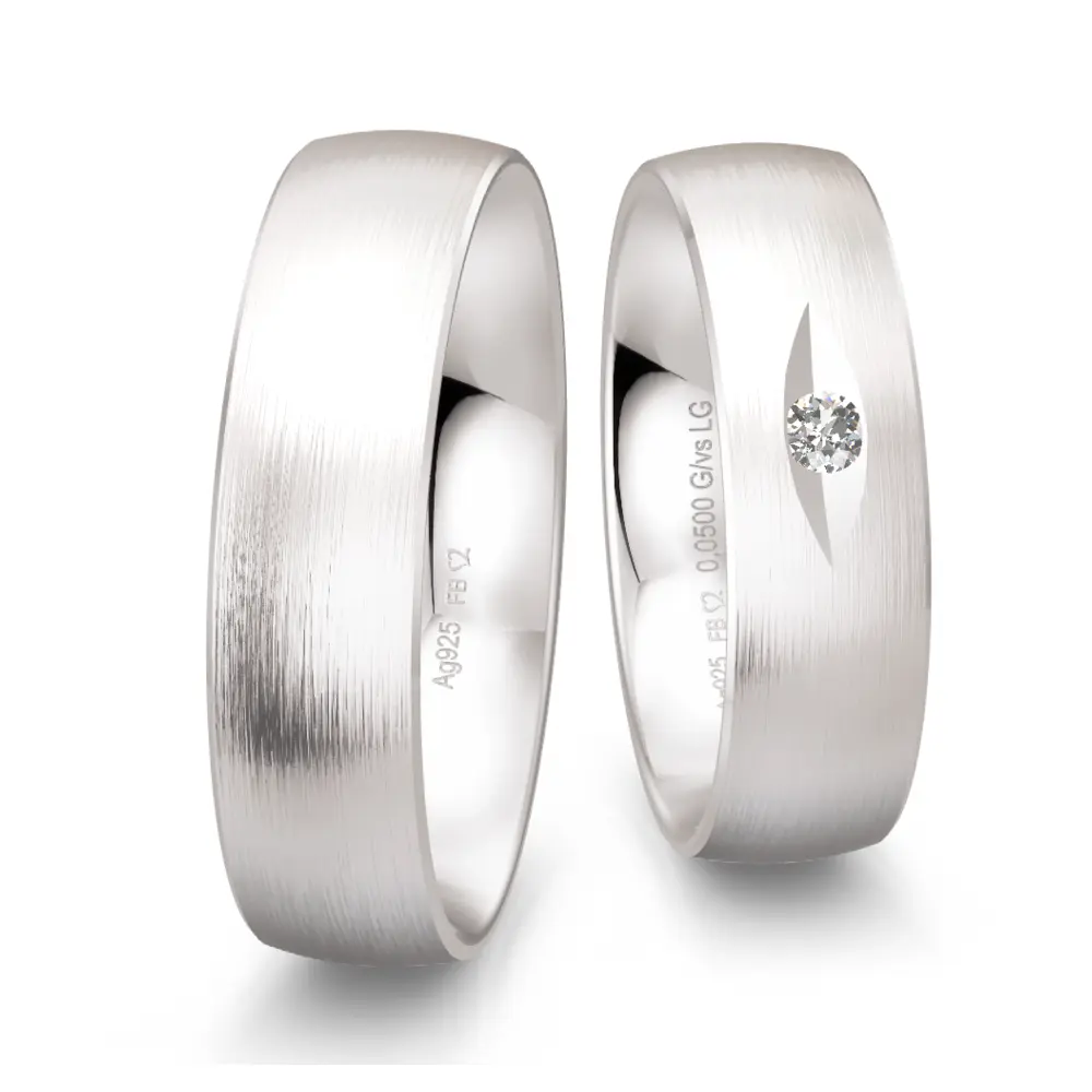 Trauringe aus mattem 925er Silber mit Labor Diamanten in elliptischer Rille