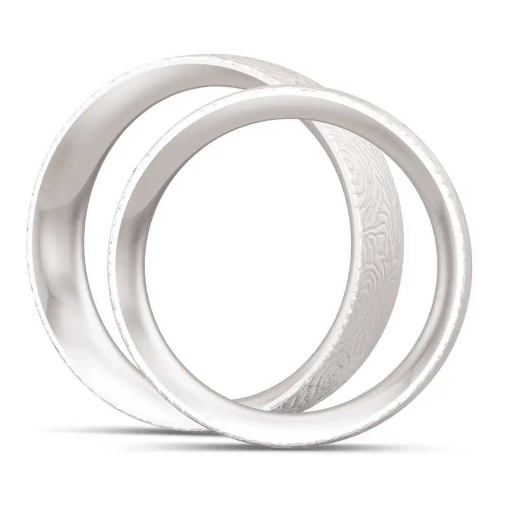 Eheringe aus Silber 925 mit 0,05 Karat Labor Diamanten und Maserung seitlich