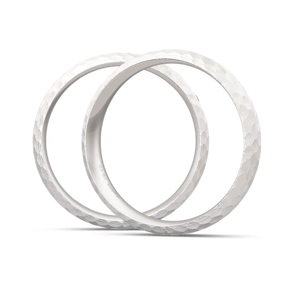 Außen gerundete 925er Silber Trauringe mit Labor-Diamanten in augenförmiger Vertiefung seitlich