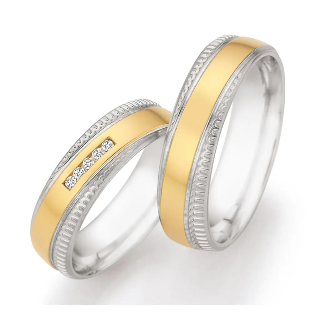 Silber & Gelbgold Trauringe mit strukturierten Rändern und Diamanten