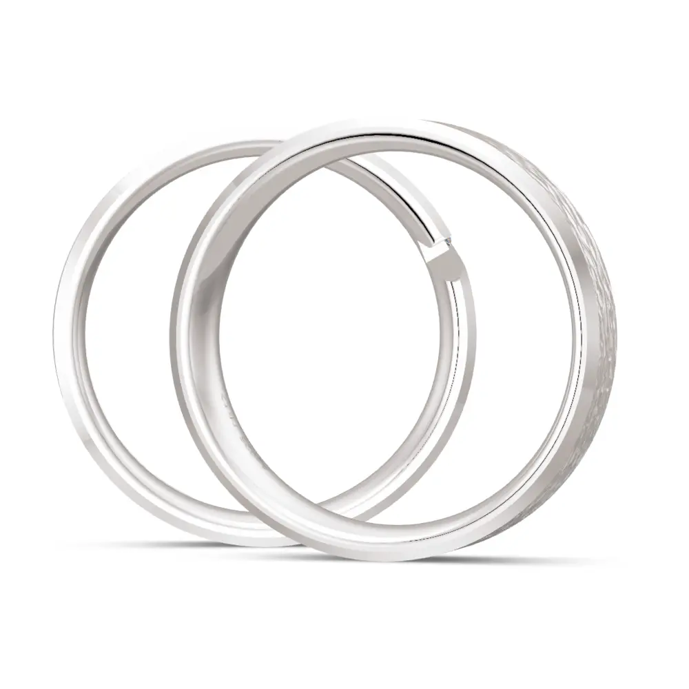 Oberflächenstrukturierte 925er Silber Trauringe mit Labor-Diamanten in Spann-Optik seitlich