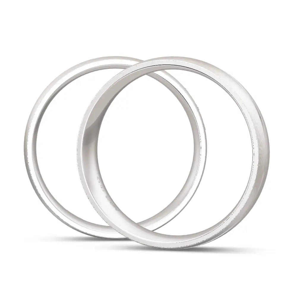 Gekörnte 925er Silber Trauringe mit drei Labor-Diamanten in gewundener Rille seitlich