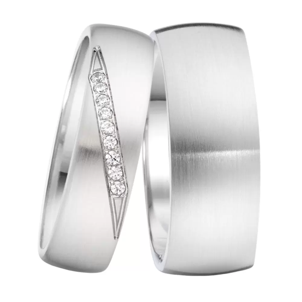 Gerundete matte Edelstahl Eheringe in zwei Breiten mit 9 Diamanten