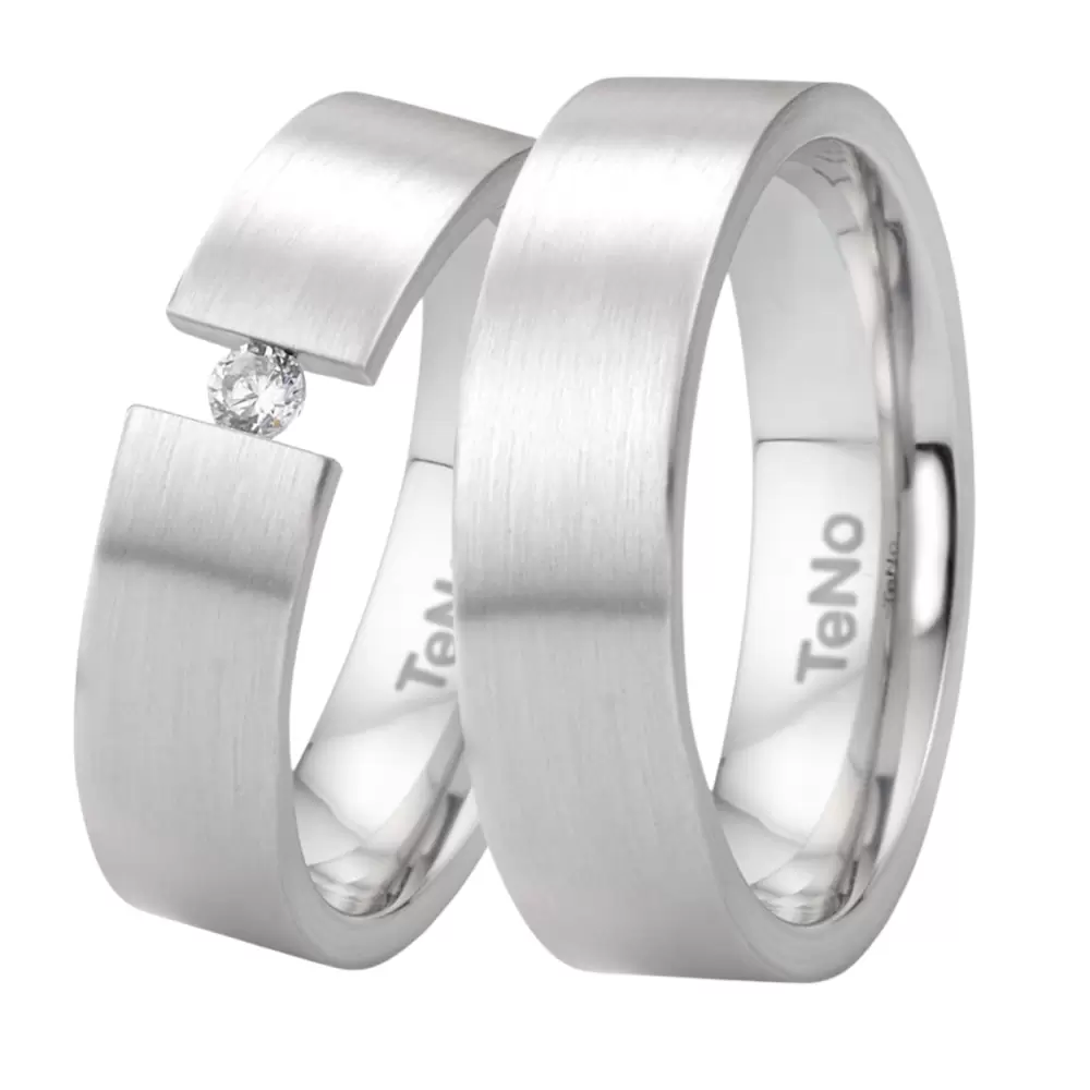 Edelstahl Eheringe mit Längsmattierung und 0,06 Karat Diamanten in Spannfassung