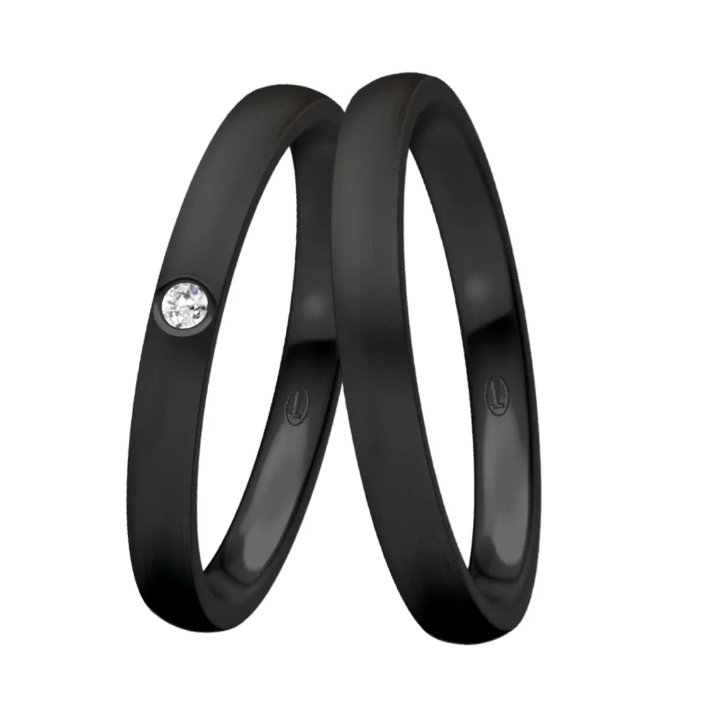 Trauringe aus schwarzem mattem Stahl mit weißen Diamanten 0,025 Karat