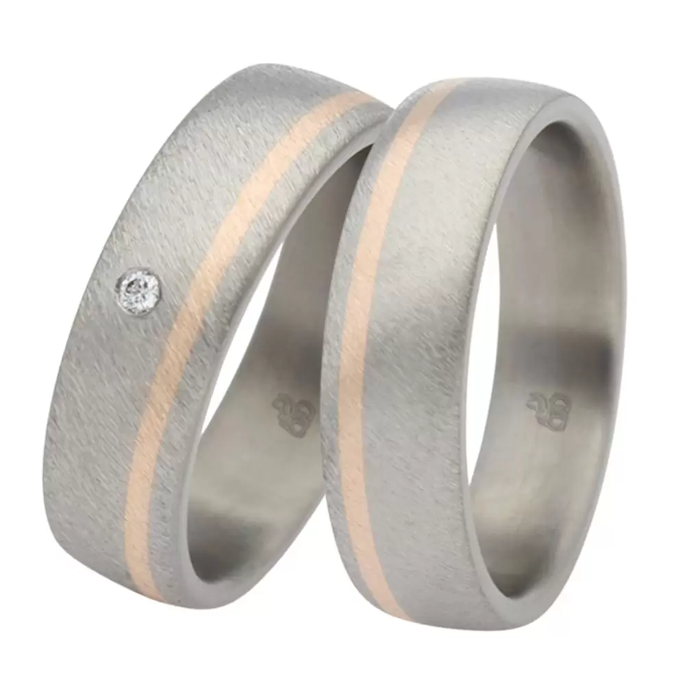 Gebürstete Titan Eheringe mit Roségold-Streifen und Labor-Diamanten