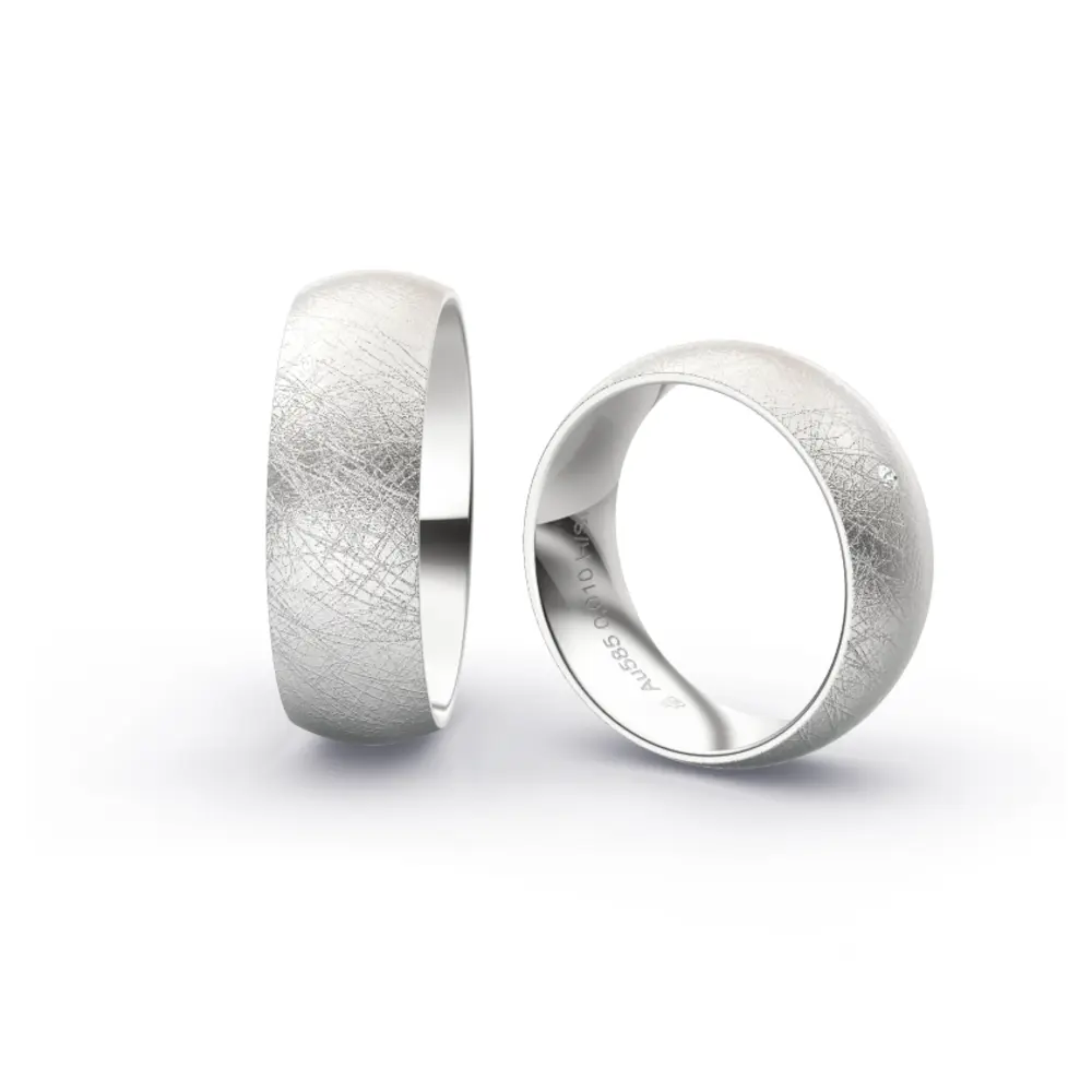 Weissgold Eheringe mit Diamanten und Eismattierung in 7 mm Breite 