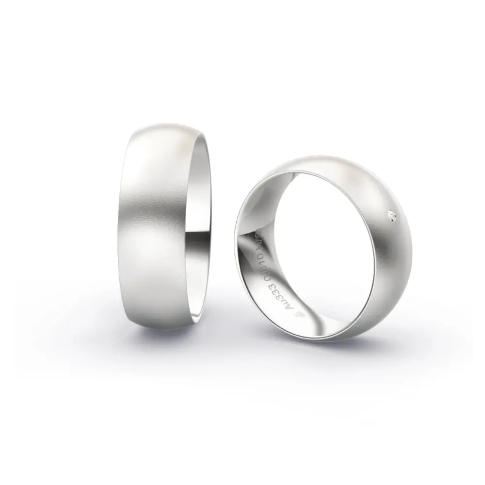 Weissgold Eheringe mit Diamanten und Sandmattierung in 7 mm Breite 