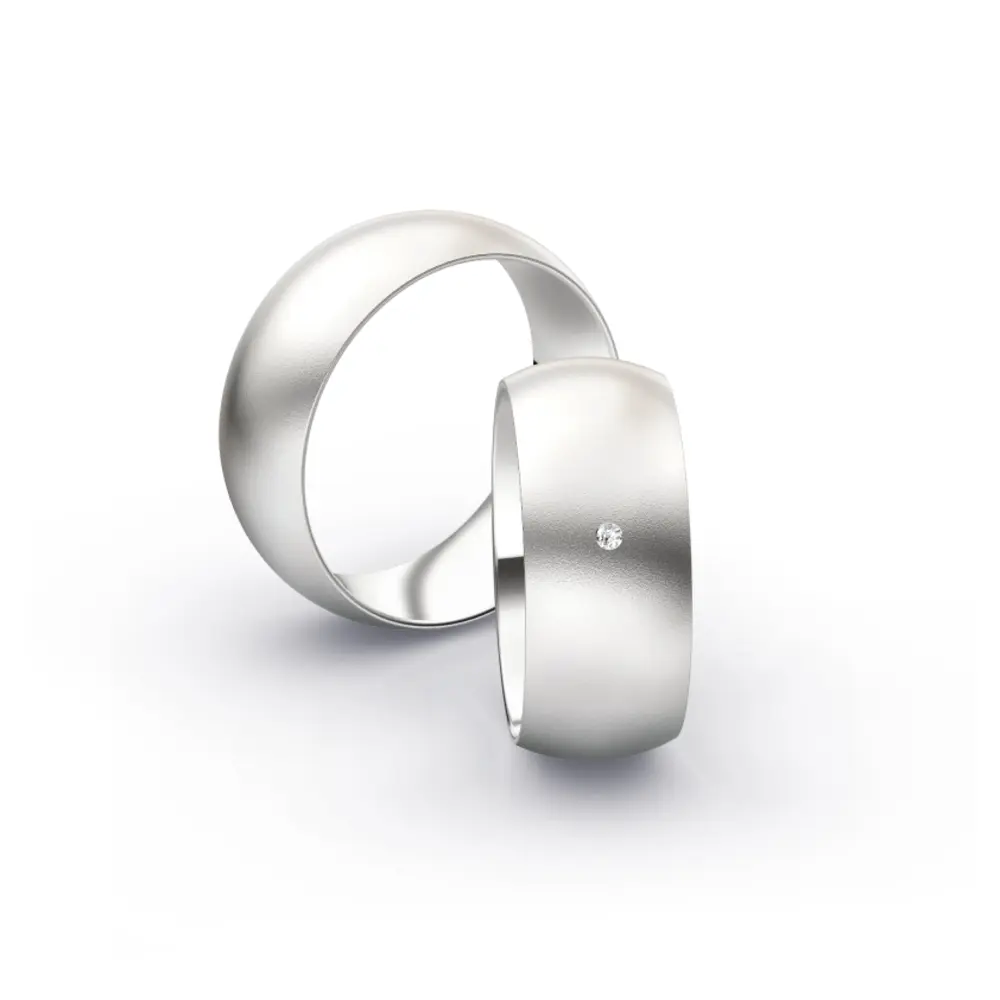 Weissgold Eheringe mit Diamanten und Sandmattierung in 8 mm Breite 