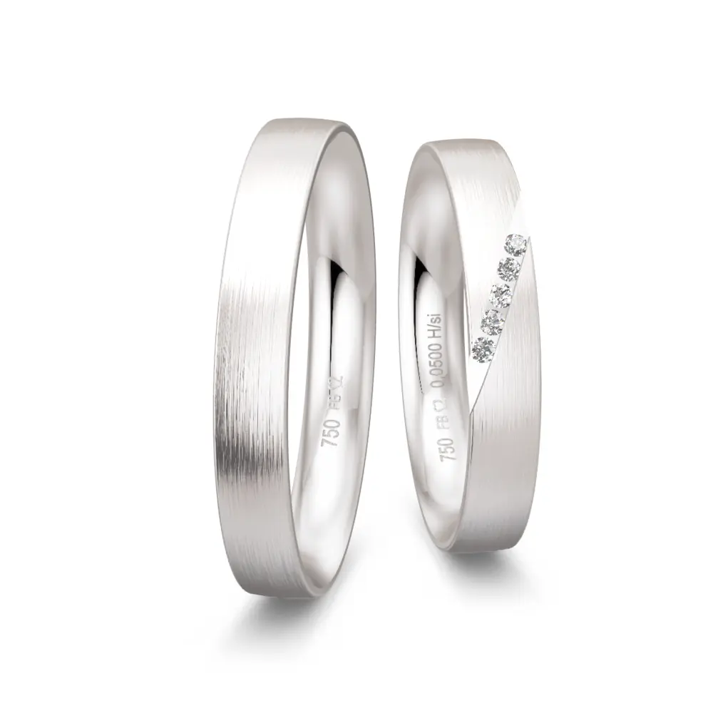 Matte Weißgold Eheringe mit 5 weißen Diamanten in schräger Rille