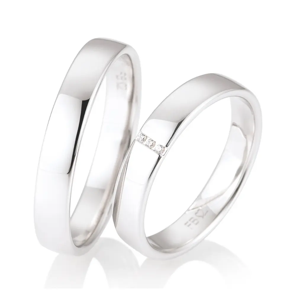 Weißgold Eheringe mit 3 Diamanten und Polierung in 4 mm