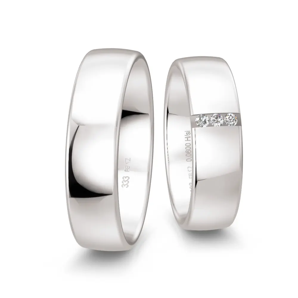 6 mm breite polierte Weißgold Eheringe mit drei Diamanten in Vertiefung