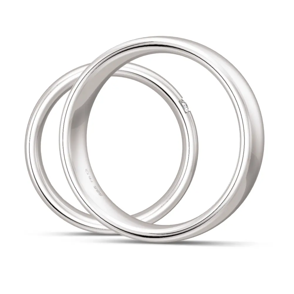 Weißgold Eheringe poliert in 6,5 mm Breite mit drei Diamanten seitlich