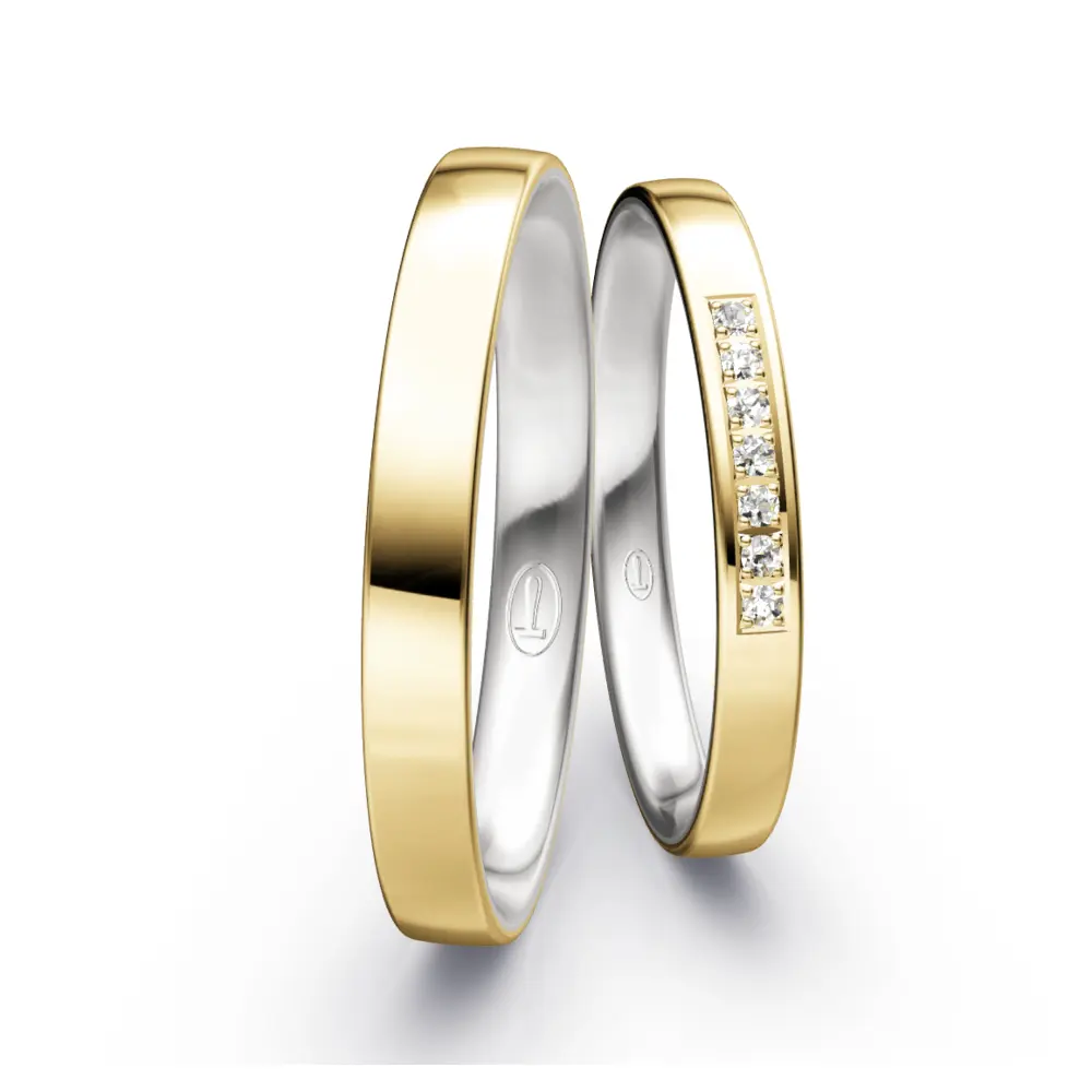 Schmale Weißgold und Gelbold Eheringe mit 7 Diamanten
