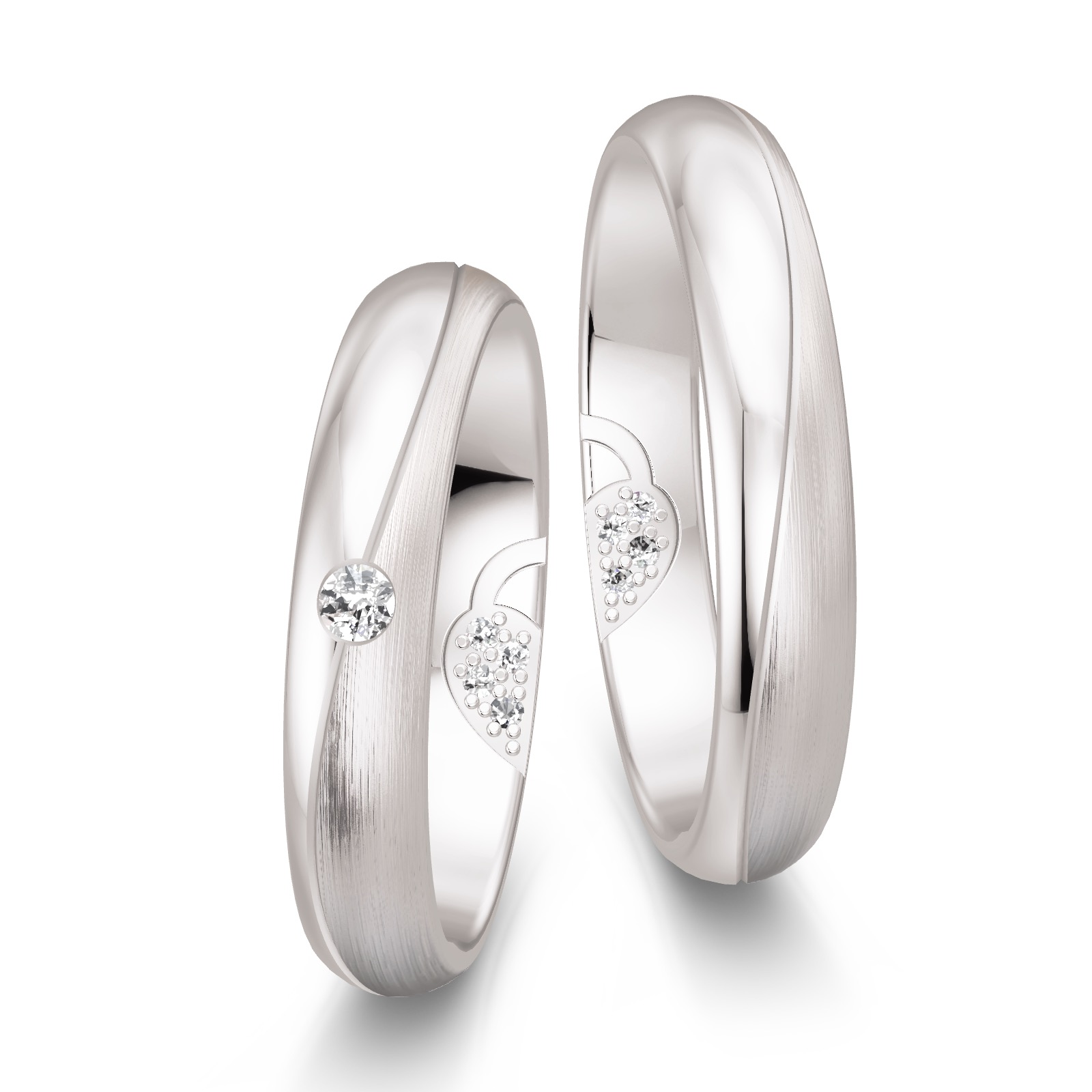 Eheringe aus Weißgold mit Diamanten und verstecktem Herz