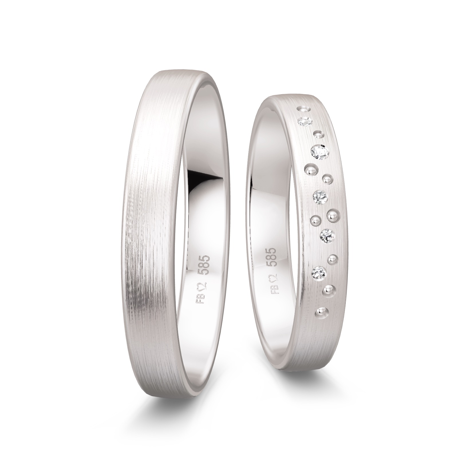 Matte Trauringe aus Weissgold mit vielen Diamanten als Sternenhimmel