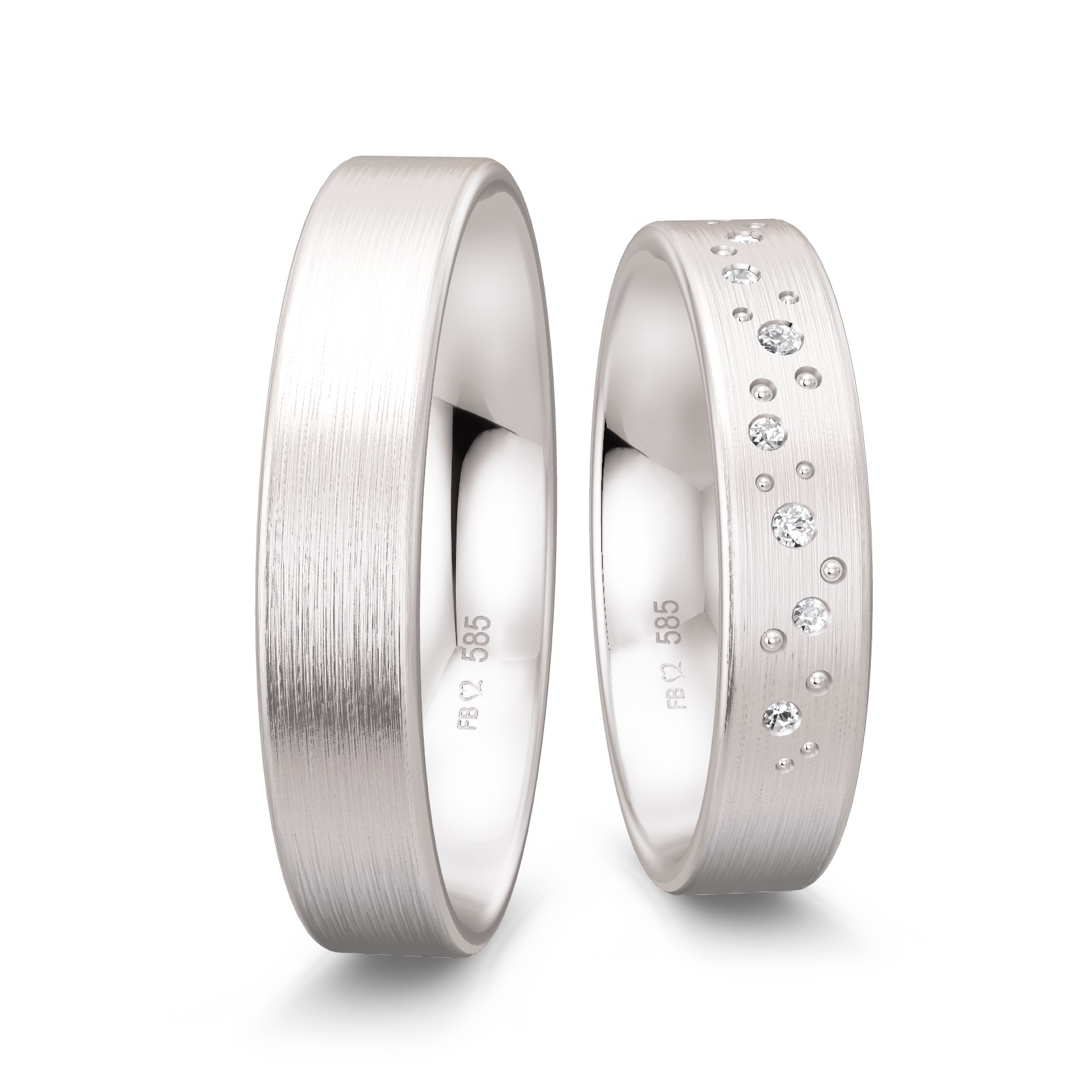 Mattierte Eheringe aus Weissgold mit 7 Diamanten und Muster aus Kreisen