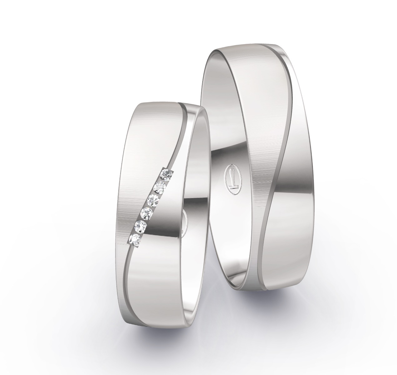 Eheringe aus Weissgold mit Diamanten und zwei Oberflächen die durch einen Rillen getrennt sind