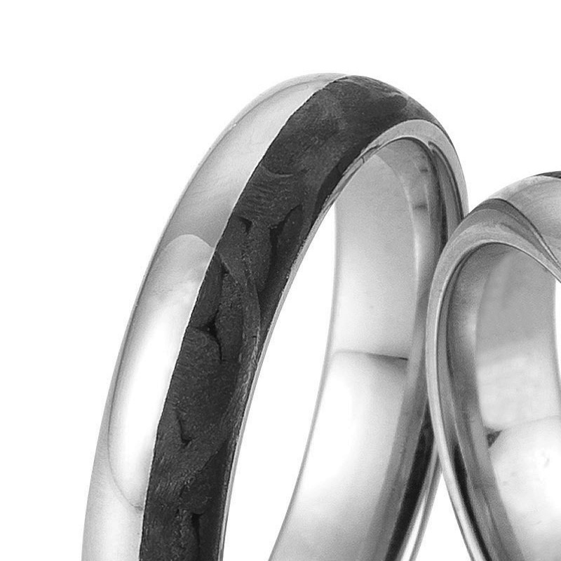 Aufnahme von Eheringen aus Palladium 500 und Carbon mit Diamanten in Kanalfassung