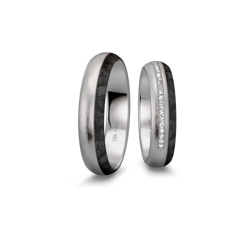 Aufnahme von mattierten Eheringen aus Palladium 500 mit schwarzem Carbon und 20 Diamanten