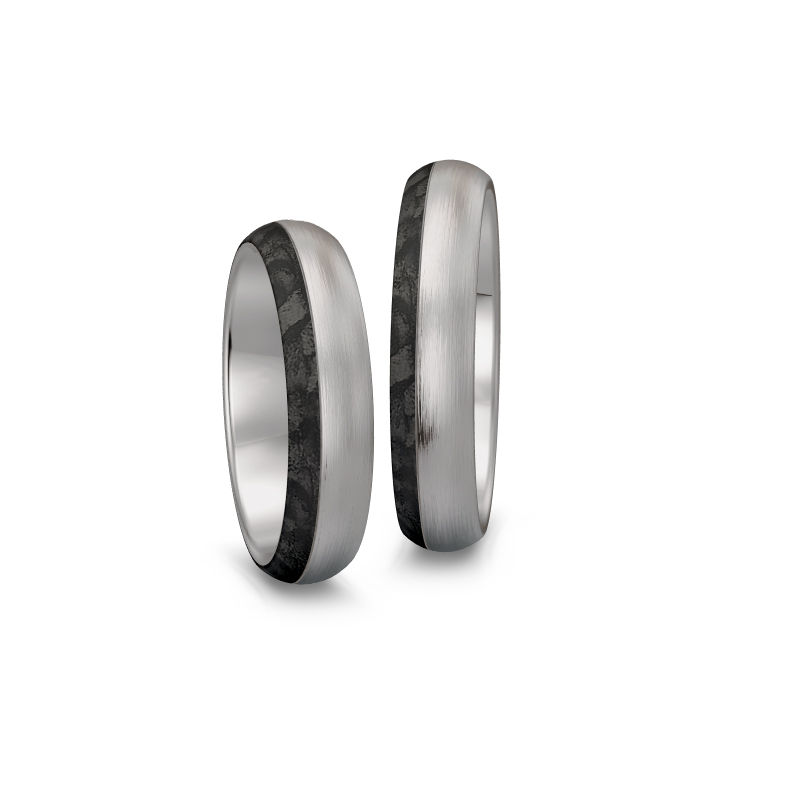 Aufnahme von mattierten Eheringen aus Palladium 500 mit schwarzem Carbon und 20 Diamanten
