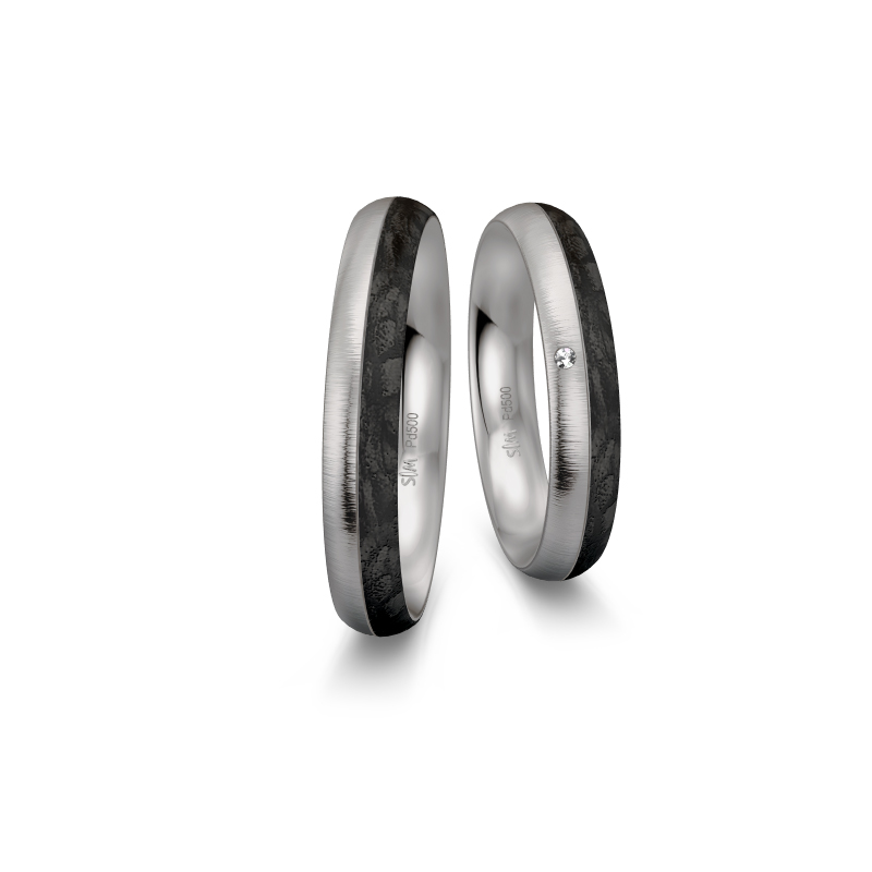 Aufnahme von Eheringen aus Palladium 500 und Carbon mit gebürsteter Oberfläche und Diamanten
